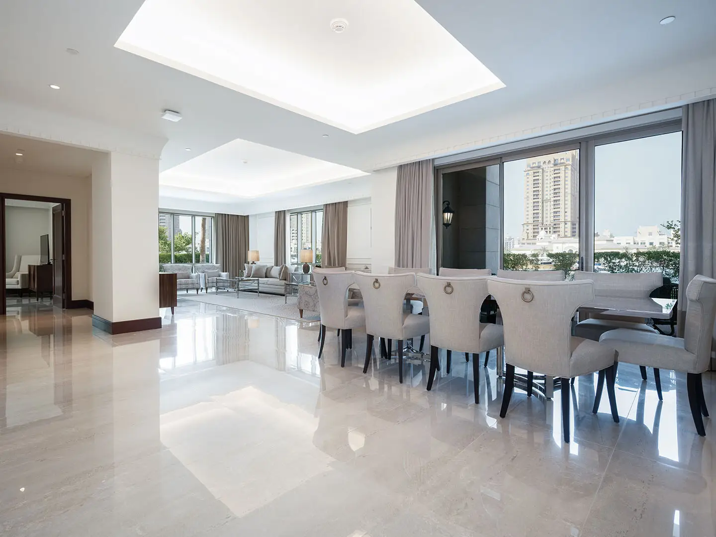 Chic dining set by large bright windows