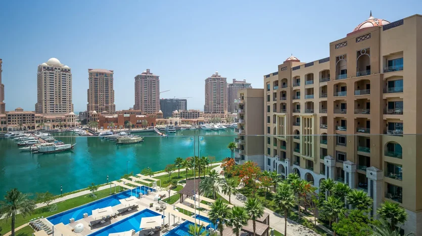 Marina with boats and pool in foreground